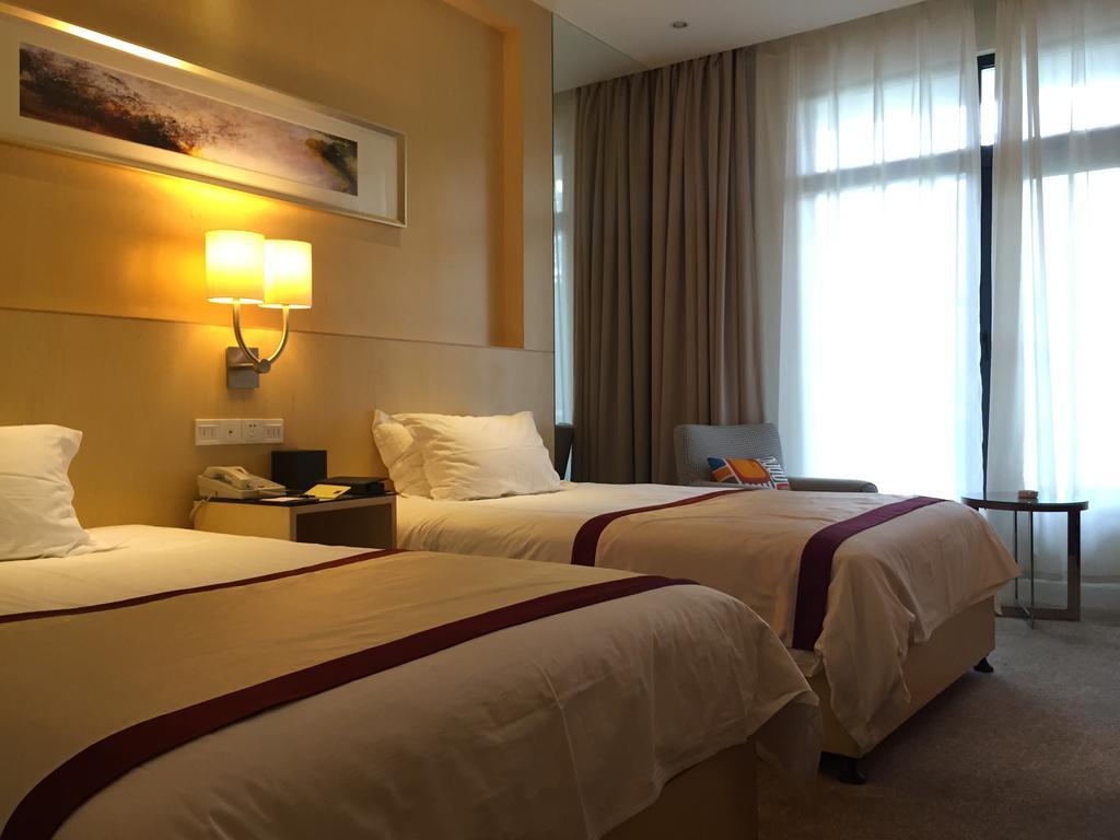 Alton Hotel Wuhu Quarto foto